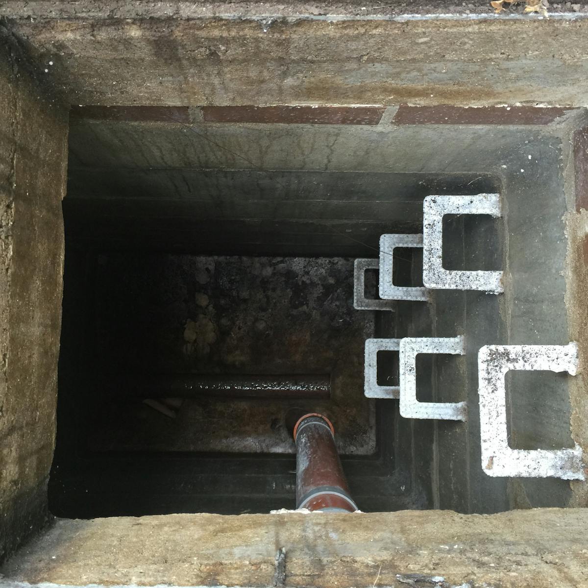 Towers Plumbing crew performing trenchless sewer repair at a Northern Utah home